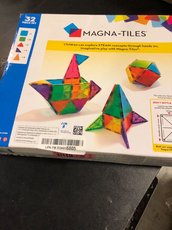 Photo 1 of MAGNA-TILES Classic 32-Piece Magnetic Construction Set, The ORIGINAL Magnetic Building Brand
