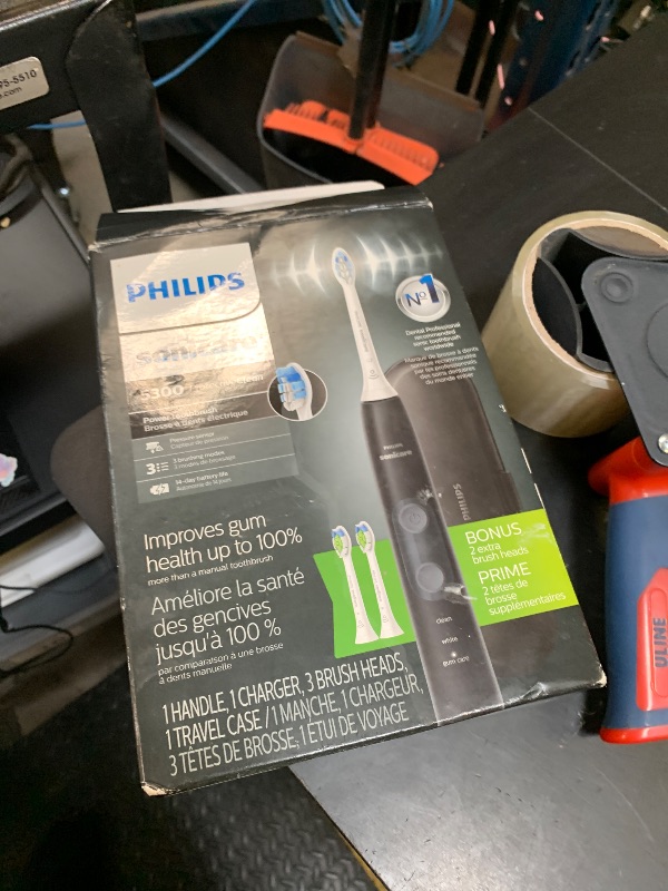 Photo 1 of Philips Sonicare ProtectiveClean 5300 Rechargeable Electric Toothbrush, with Pressure Sensor, 3 Cleaning Modes, SmarTimer and QuadPacer, with 2 Bonus Brush Heads, Travel Case, Black, Model HX6423/34