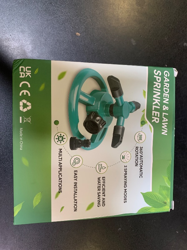 Photo 1 of Sprinklers for Yard, Water Sprinkler for Lawn, 360 Degree Rotating Lawn Sprinkler for Yard Large Area, Sprinklers for Kids, Pets Playing