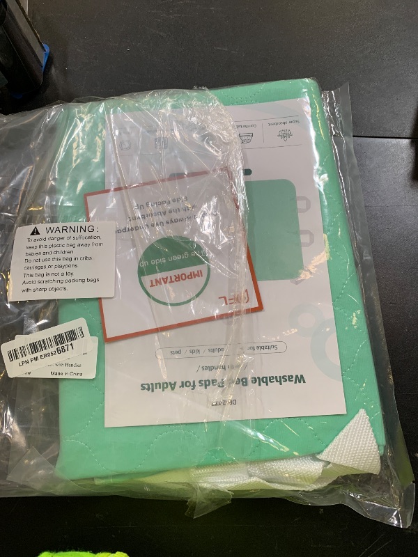 Photo 1 of Washable Bed Pad for Incontinence: Reusable Underpads Transfer Board Pads with 10 Strong Handles, Waterproof Positioning Bed Pads for Elderly,Adult,Bedridden,Hospitals, 34x36 in