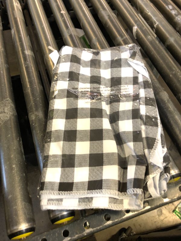 Photo 1 of Heavy Duty Vinyl Tablecloth with Flannel Backing Waterproof Oil-Proof Plastic Table Cloth Stain-Resistant Wipeable Rectangle or Square Table Cover for Indoor and Outdoor (Black Checkered, 52x70 Inch)