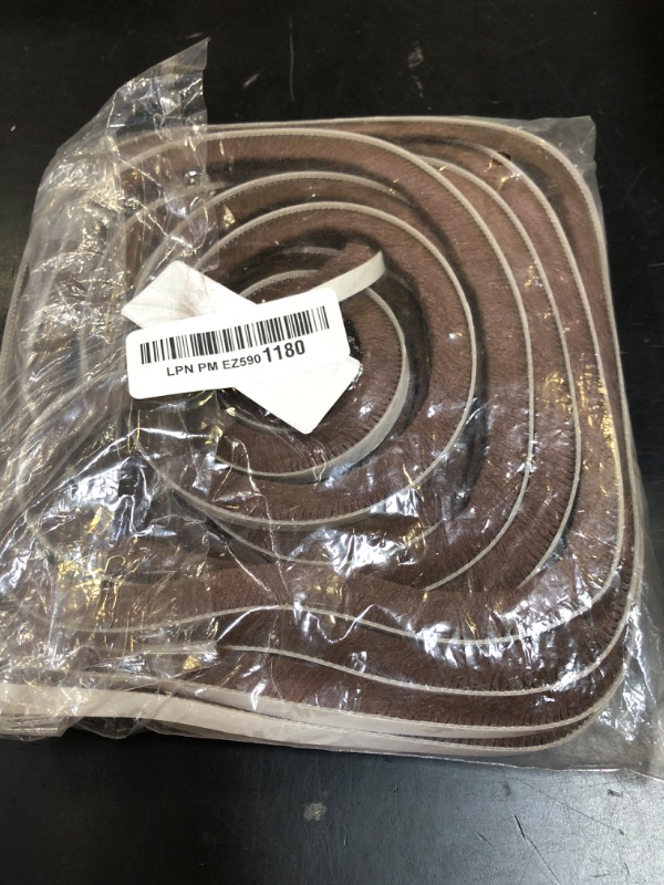 Photo 1 of uxcell Self Adhesive Brush Seal Weather Stripping 1/2" x 1/4" x 36ft, Door Brush Strip for Sliding Sash Door Window Wardrobe Seal, Brown