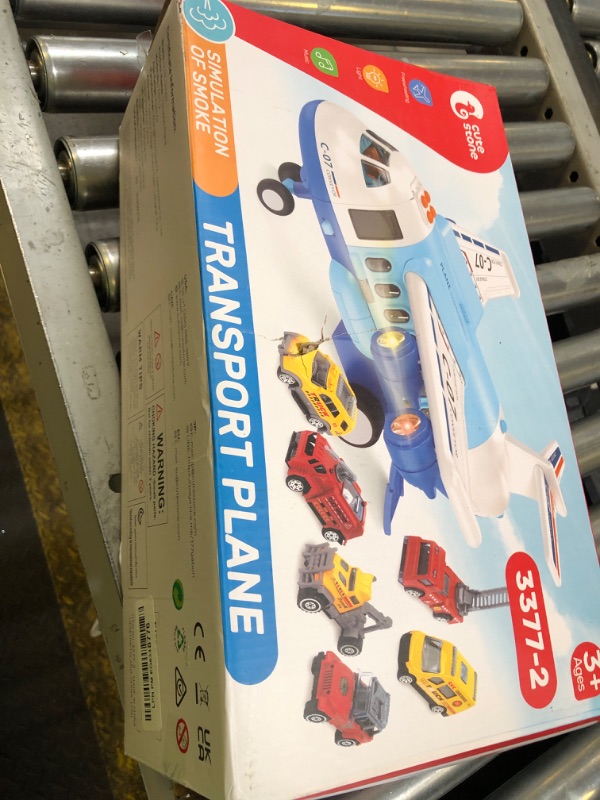 Photo 1 of Toy Airplane with Smoke, Lights & Sounds, Friction Powered Plane Toy with Mini Cars for Kids, Boys and Girls