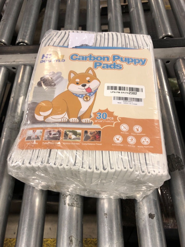Photo 1 of HIDOGGYLD Dog Pee Pads Extra Large 28" x 34", 30 Count, Activated Carbon Charcoal Puppy Pads XL, Potty Pads for Dogs with Adhesive Sticky Tape, Disposable Training Bed Pads for Pets, Doggies, Cats
