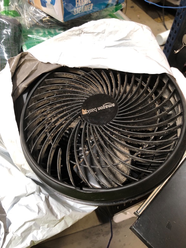 Photo 1 of *USED* Amazon Basics Air Circulator Fan, Desk Fan for Bedroom, Home and Office, With 90-Degree Tilt Head, 3 Speed Settings, Lightweight (3 LBS), 35 Watts, Black, 11.1"W x 6.3"D x 10.9"H