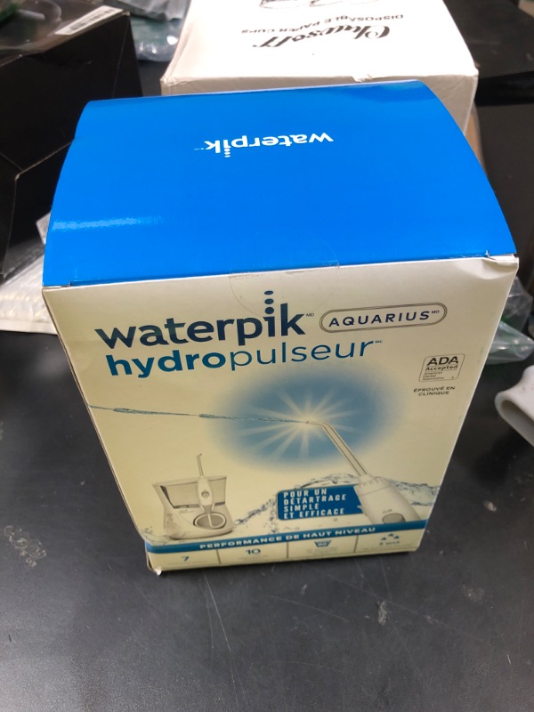 Photo 1 of Waterpik Aquarius Water Flosser For Teeth Cleaning, Gums, Braces, Dental Care, Electric Power With 10 Settings, 7 Tips For Multiple Users And Needs, ADA Accepted, White WP-660, Packaging May Vary