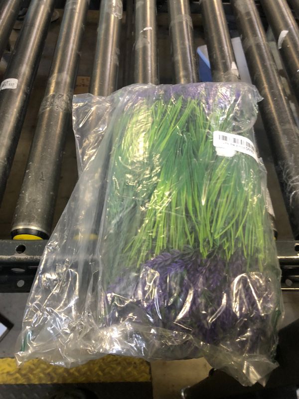 Photo 1 of Zeyune 36 Bundles Artificial Plants Outdoor Fake Monkey Grass with Flowers Greenery UV Resistant Faux Outdoor Plants Plastic Flowers for Garden Office Patio Pathway Outside Decor(Purple)