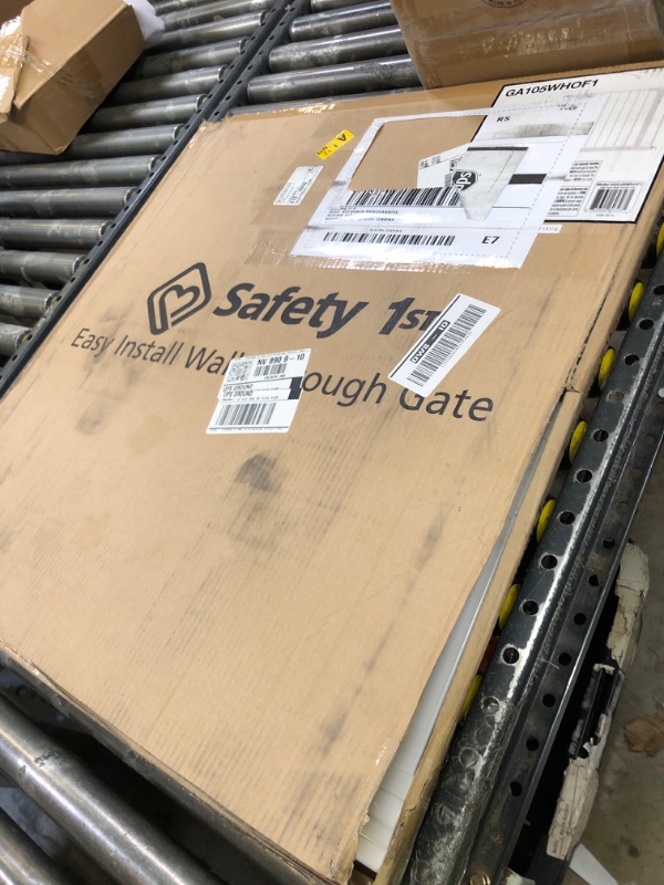 Photo 1 of Safety 1st Easy Install Walk Thru Baby Gate for Doorways, Gate With Door, Dog Gates, Fits 29"-38", Easy Install 28" Tall, White
