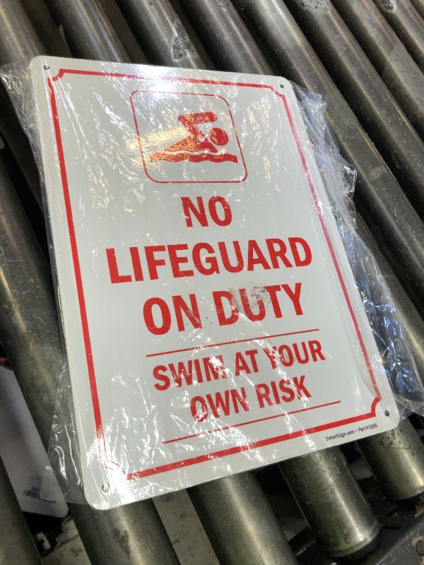 Photo 1 of SmartSign 14 x 10 inch “No Lifeguard On Duty - Swim At Your Own Risk” Metal Sign with Symbol, Screen Printed, 40 mil Laminated Rustproof Aluminum, Red and White, Made in USA