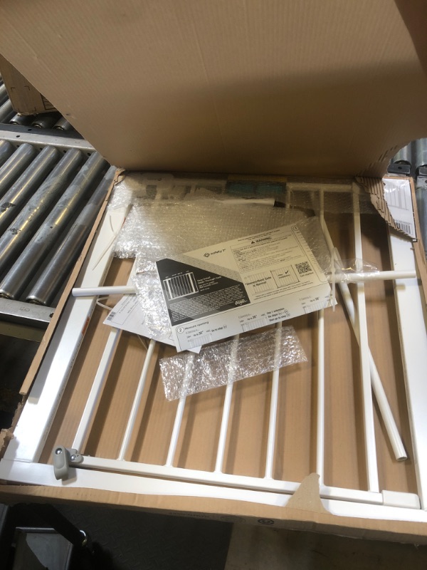 Photo 1 of Safety 1st Easy Install Walk Thru Baby Gate for Doorways, Gate With Door, Dog Gates, Fits 29"-38", Easy Install 28" Tall, White