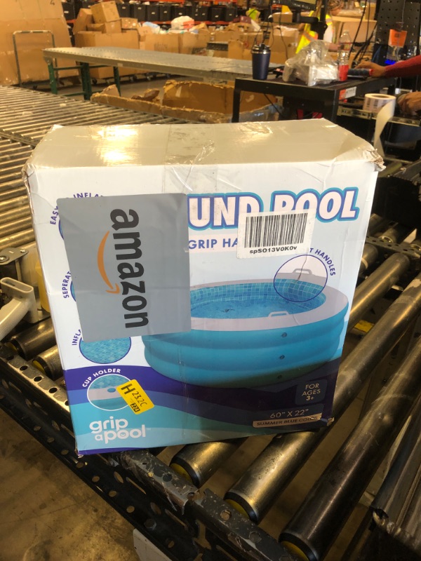 Photo 1 of Inflatable Round Swimming Pool with Blow Up Padded Floor, Cup Holder, Handles and Drain - 60"x22" Deep Round Large Kiddie Pool Perfect for Adults and Kids Ages 4 5 6 7 8+