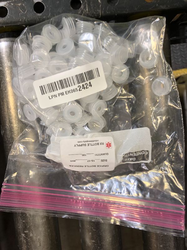 Photo 1 of Orifice Reducers for Our 1 Ounce Grad Oval Bottles 15 mm Neck Opening-Package of 100