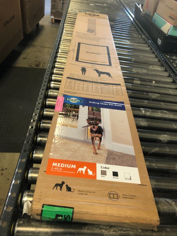 Photo 1 of PetSafe Doggy Door for Sliding Glass Doors, Adjustable Height 75 7/8" to 81", No-Cut DIY Install, Aluminum Panel, Ideal for Renters, for Medium Dogs Up to 40 lb., (White, Medium)