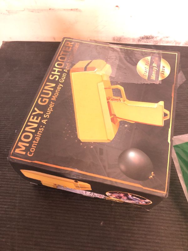 Photo 1 of Make It Rain Money Gun Spary Paper Party Toys, Gold Money Gun Shooter with 104 PCS Prop Paper, Cash Cannon Dollar Bill Gun Dispenser Fake Gun Money Thrower Gun for Game Movies (Batteries Included)