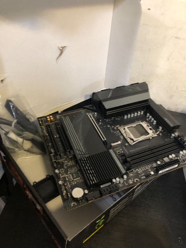 Photo 1 of GIGABYTE B650 AORUS Elite AX AMD B650 ATX Motherboard with DDR5, PCIe 5.0, WiFi 6E, 5-Year Warranty