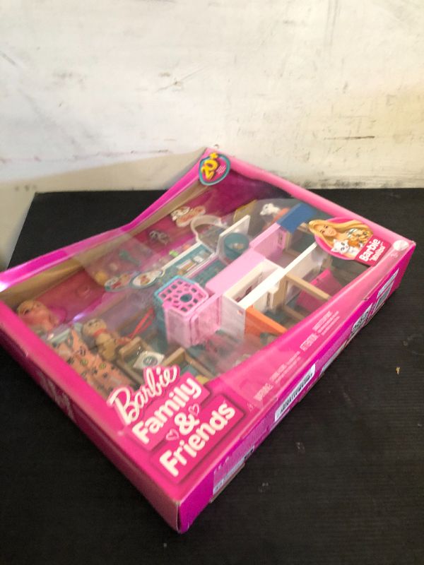 Photo 1 of Barbie Doll & Playset, Pet Boutique with 4 Pets, Color-Change Grooming Feature & 20+ Themed Accessories