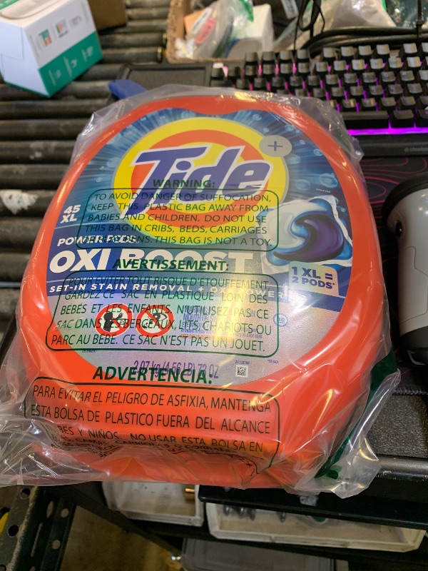 Photo 1 of Tide Oxi Boost Power PODS Laundry Detergent Pods, 45 Count, HE Compatible, Stain Remover Plus Oxi Power, Removes Tough Set-In Stains