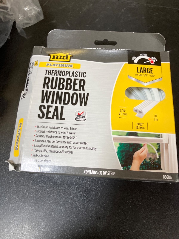 Photo 1 of M-D Building Products 05686 5/16 in. x 19/32 in. x 10 ft. White Premium Thermoplastic Rubber Platinum™ Window Seal for Large Gaps