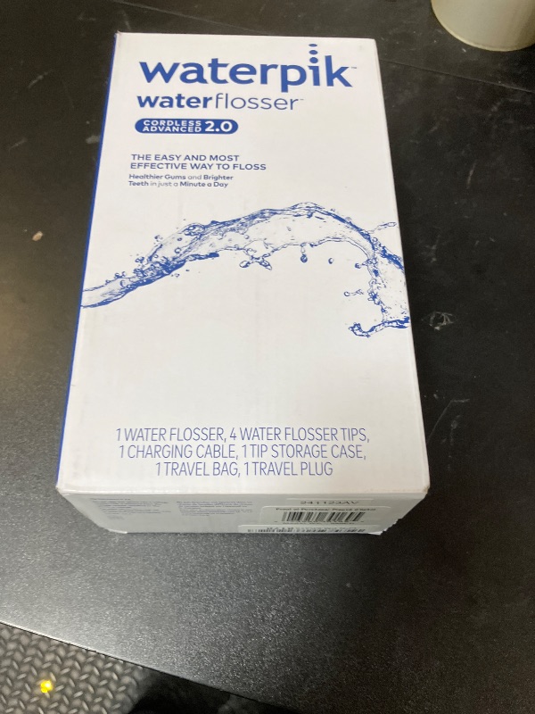 Photo 1 of Waterpik Cordless Advanced 2.0 Water Flosser For Teeth, Gums, Braces, Dental Care With Travel Bag and 4 Tips, ADA Accepted, Rechargeable, Portable, and Waterproof, White WP-580, Packaging May Vary
