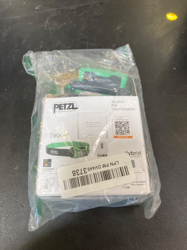 Photo 1 of PETZL Tikka Headlamp - Compact 350 Lumen Light with Red Lighting, for Hiking, Climbing, Running, and Camping - Green