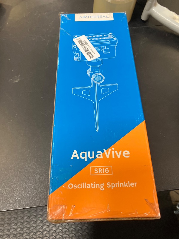 Photo 1 of Airthereal Oscillating Sprinkler with Metal Step Spike and Quick Connect Adapter Set, Control Watering Range, Width, and Flow Rate, Covers up to 4,069 sq.ft., Blue
