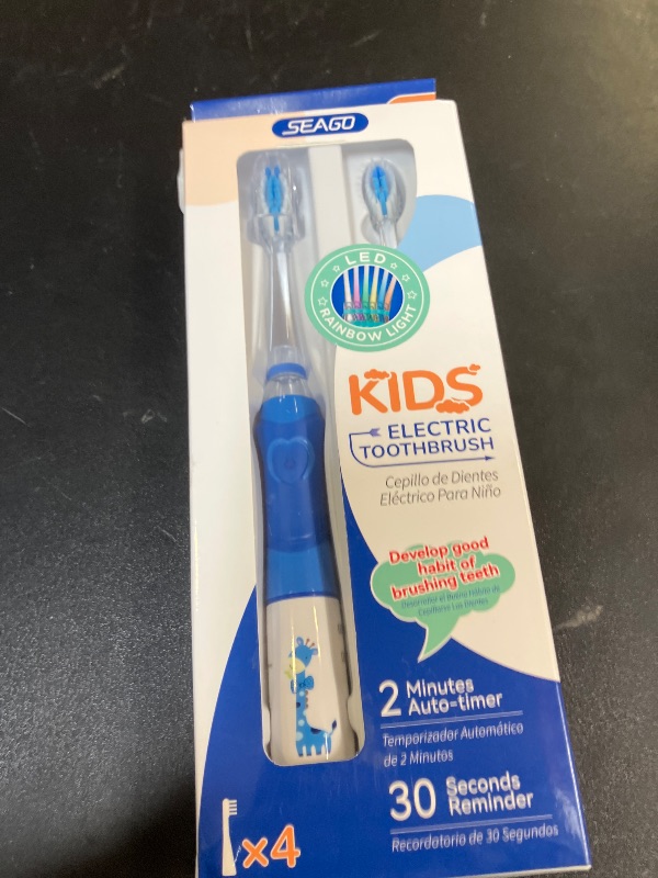 Photo 1 of SEAGO Kids Electric Toothbrush with 2 Mins Brushing Timer and 4 Replacement Bursh Heads, Rainbow LED Light Make Brushing Fun, Blue Color Boys Battery Powerd Toothbrush for 4-12 Years Old?SG-977