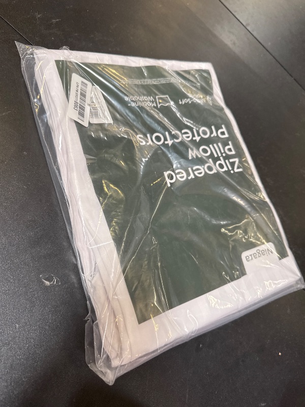Photo 1 of Set of 4 Pillow Protectors with Zipper Queen Size - 100% Resistant to Stains, Dust & Dirt - Washable Covers for Increased Pillow Lifespan