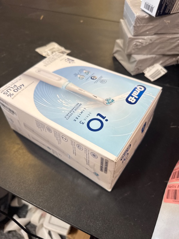 Photo 1 of Oral-B iO Deep Clean Rechargeable Electric Powered Toothbrush, White with iO Series 3 Limited, 2 Brush Heads and Travel Case - Pressure Sensor to Protect Gums - 3 Cleaning Settings - 2 Minute Timer