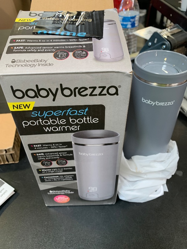 Photo 1 of Baby Brezza Superfast Portable Baby Bottle Warmer – 67% Faster - Travel Breastmilk Warmer and Formula Warmer - Safe, Even Heating - Up to 9oz - No Adapters, Grey