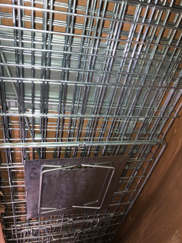 Photo 1 of Live Animal Trap for Possum, Groundhog,Gopher,Beaver,Folding Raccoon Trap,Humane Live Animal Cage, Humane Small Animal Trap 32 X 12 X 12.5Inch Animal Trap,Catch and Release,Easy to Install and Use