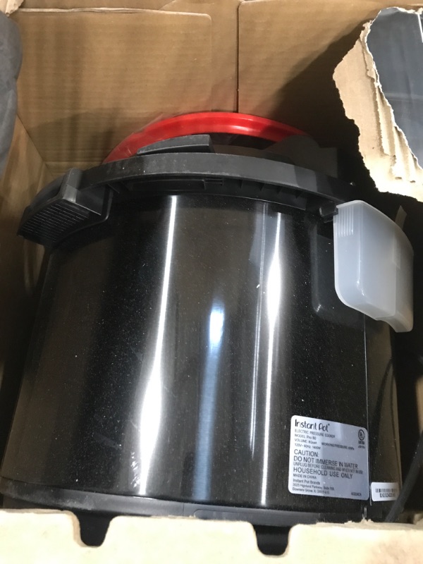Photo 1 of DENTED SIDE Instant Pot Pro (8 QT) 10-in-1 Pressure Cooker, Slow Cooker, Rice/Grain Cooker, Steamer, Sauté, Sous Vide, Yogurt Maker, Sterilizer, and Warmer, Includes App With Over 800 Recipes, Black