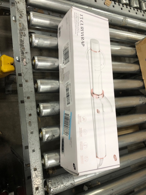 Photo 2 of T3 CurlWrap 1.25" Automatic Rotating Curling Iron with Long Barrel, 2 Timer Settings, 9 Heat Settings, Auto-Rotating Ceramic Barrel and Ion Generator for Fast, Easy Curls and Waves on All Hair Types