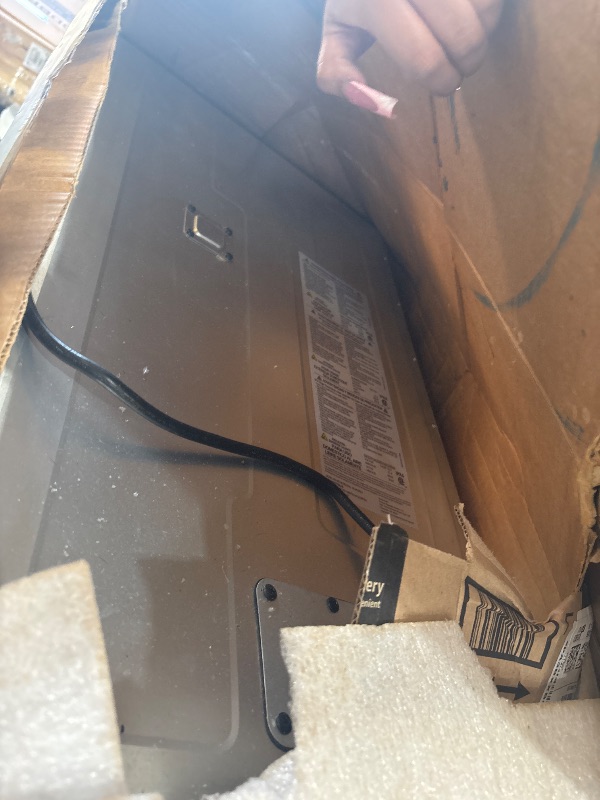 Photo 1 of Masterbuilt®710 WiFi Digital Smoker, Vertical Design, 711 Cooking Sq. Inches, 4 Chrome Coated Smoking Racks, Wood Chip Loader, Electric Fuel Source to Plug in and Start Cooking, Black Model MB20070924