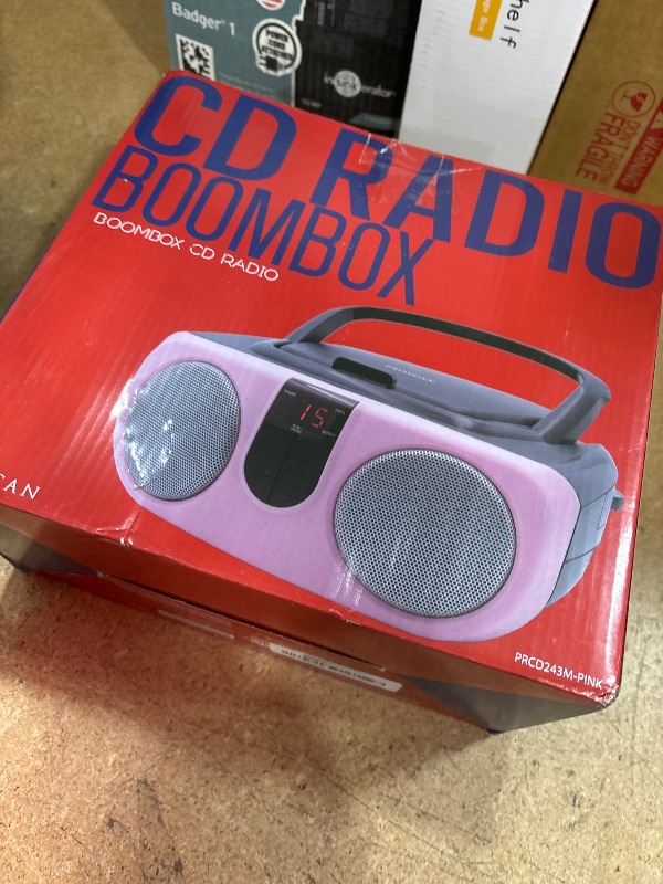 Photo 1 of PROSCAN SRCD243 Portable CD Player with AM/FM Radio, Boombox (Pink)