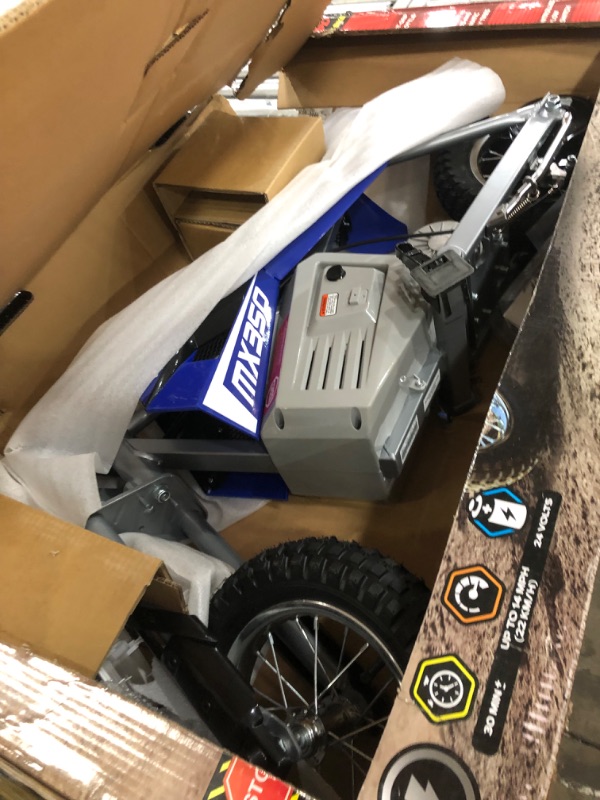 Photo 1 of PRE OPENED
Razor MX350 Dirt Rocket Electric Motocross Off-Road Bike for Age 13+, Up to 30 Minutes Continuous Ride Time, 12" Air-Filled Tires, Hand-Operated Rear Brake, Twist Grip Throttle, Chain-Driven Motor