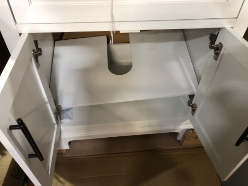 Photo 4 of ***USED - LEG DAMAGED - SEE PICTURES - PARTS LIKELY MISSING***
Doveton 30 in. Single Sink Freestanding White Bath Vanity with White Engineered Marble Top (Assembled)