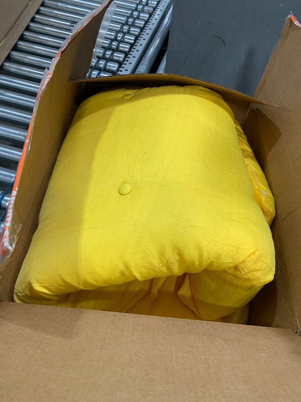 Photo 1 of yellow lawn chair cushion