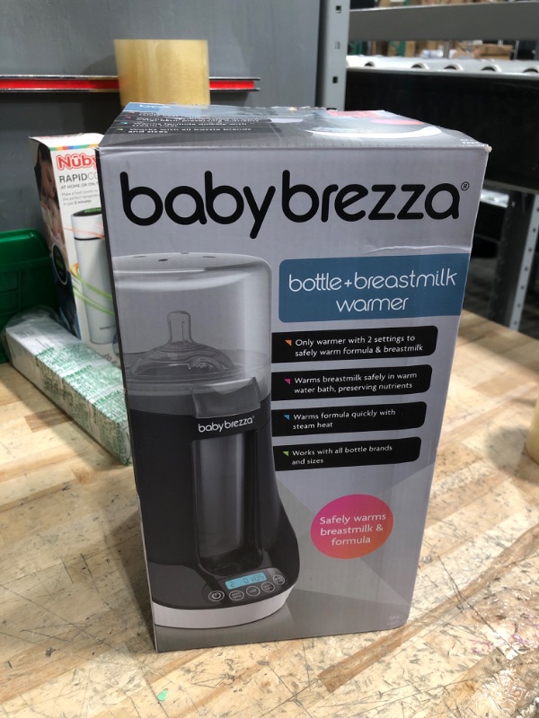 Photo 1 of Baby Brezza Electric Baby Bottle Warmer, Breastmilk Warmer + Defroster - Only Brand with Different Temperatures for Breastmilk + Formula - Universal Fit for All Baby Bottle Sizes + Breastmilk Bags