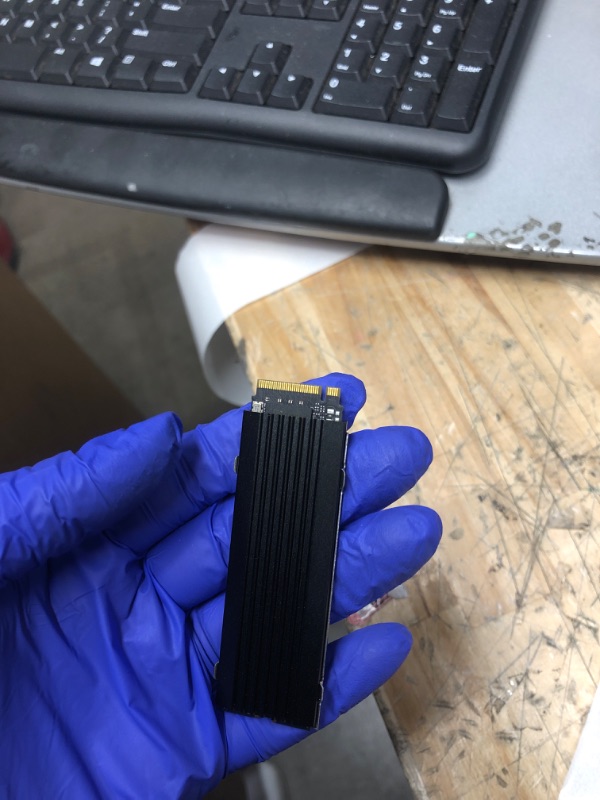 Photo 1 of ORICO NVMe SSD 1TB M.2 with Heatsink, Up to 3100MB/s PCIe Gen3x4 2280 Internal Solid State Drive, SLC Cache 3D NAND, Compatible with Laptop and PC Desktops -J10