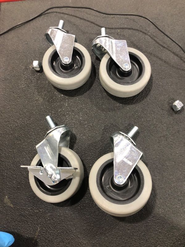 Photo 1 of **NOT EXACT** Set of 4-3" Replacement Swivel Casters for use on Mop Buckets