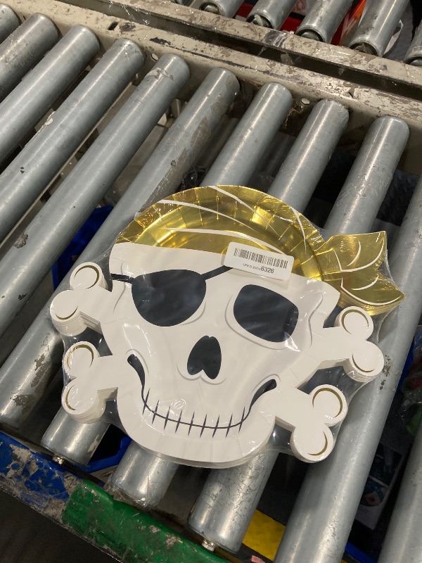 Photo 2 of BLUE PANDA 48 Pack Gold Foil Pirate Plates for Pirate Birthday Party Supplies, Tableware (Skull Design, 13 x 10 In)