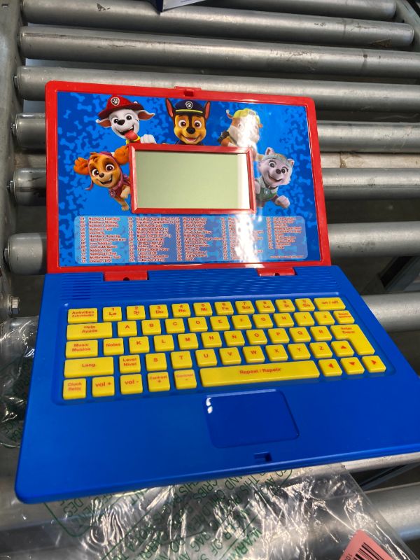 Photo 3 of ***DOES NOT HAVE ACCESSORIES** Lexibook Paw Patrol - Educational and Bilingual Laptop Spanish/English - Toy for Child Kid (Boys & Girls) 124 Activities, Learn Play Games and Music with Chase Marshall - Red/Blue JC598PAi2