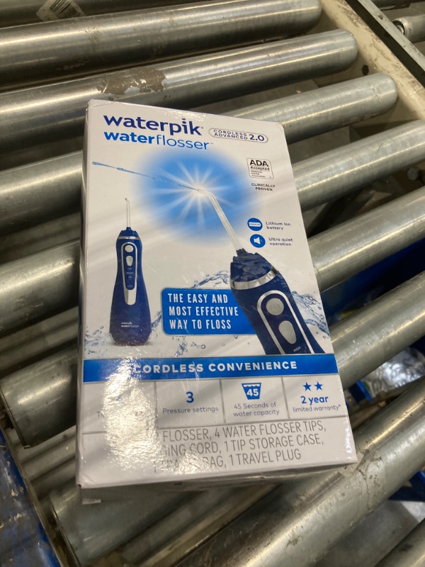 Photo 1 of Waterpik Cordless Advanced 2.0 Water Flosser For Teeth, Gums, Braces, Dental Care With Travel Bag and 4 Tips, ADA Accepted, Rechargeable, Portable, and Waterproof, Blue WP-583, Packaging May Vary