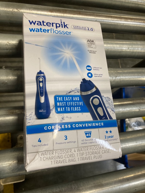 Photo 1 of Waterpik Cordless Advanced 2.0 Water Flosser For Teeth, Gums, Braces, Dental Care With Travel Bag and 4 Tips, ADA Accepted, Rechargeable, Portable, and Waterproof, Blue WP-583, Packaging May Vary