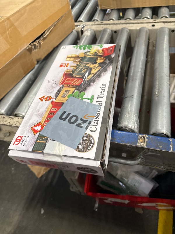 Photo 1 of JUQU Train Set-Electric Train Sets for Boys Toddlers Classical Train Toys,Battery-Powered Locomotive Engine with Sound and Lights, 3 Cars &10 Tracks, Christmas Toy Train for Age 3 4 5 6 Years Old Kids