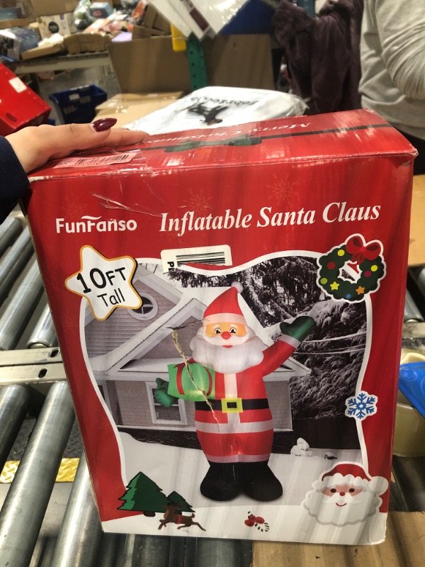 Photo 1 of 10 FT Christmas Inflatable Santa Claus Decoration, Blow up Giant Santa Claus Holding Gift Box, Built-in LED Lights for Outdoor Yard Patio Garden Lawn Hall Display Xmas Vacation Holiday Party Decors