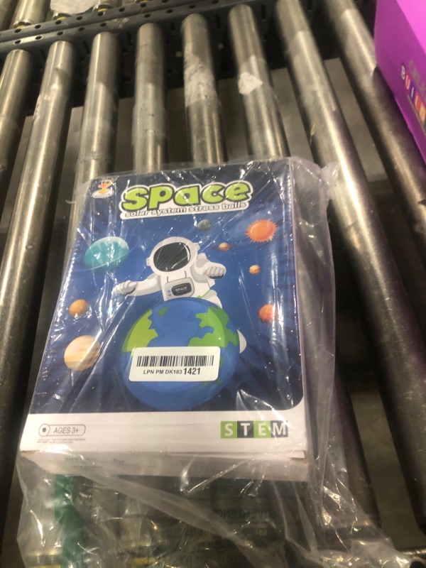 Photo 1 of Solar System Planets Toys for Kids, STEM Educational Sensory Toys for Autistic Children Non-Toxic, Space Astronaut Slime Ball Alien Monster Toy Set with Mesh Storing Bag for 3-5-8-10 Boy Girls