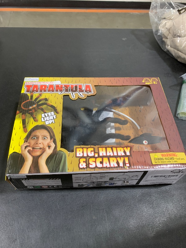 Photo 1 of ArtCreativity Remote Control Spider, Includes 1 Tarantula & 1 Controller, Spooky RC Spider Prank Toy with 8 Individually Moving Legs, Furry Texture, and Light Up Eyes, Great Halloween Toy for Kids