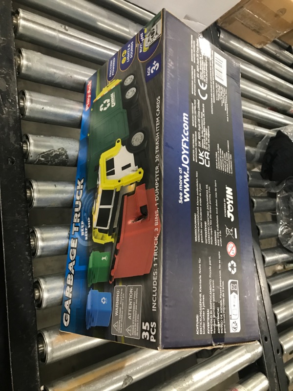 Photo 1 of JOYIN Large Friction Powered Garbage Truck Toy Set, Includes Dumpster, Trash Bins, and Learning Cards for Kids