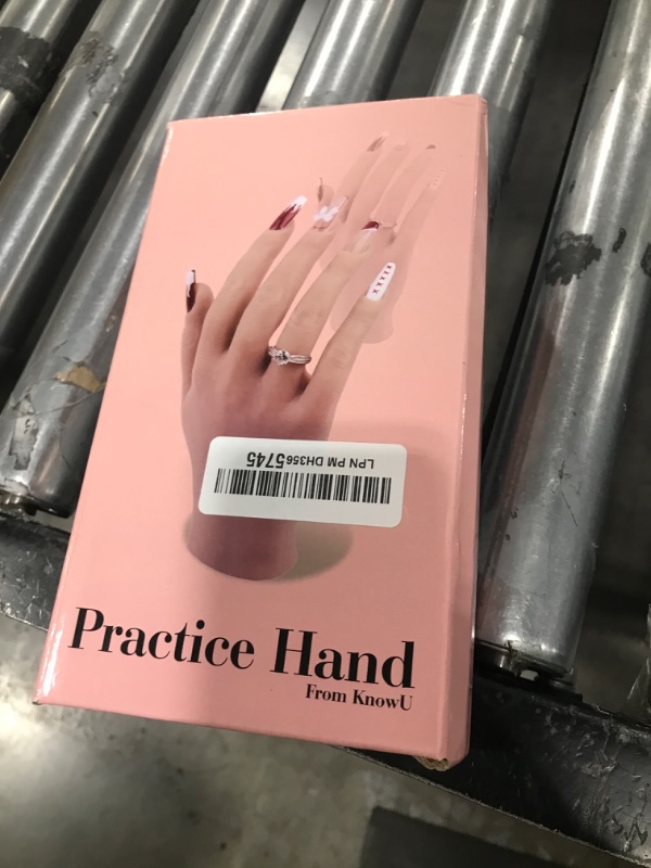 Photo 1 of Practice Hand for Acrylic Nails with Stand Bracket, Silicone Fake Hands to Practice Fake Nails Mannequin Hand for Nails Practice and Nail Art Single Right Hand Color 1#